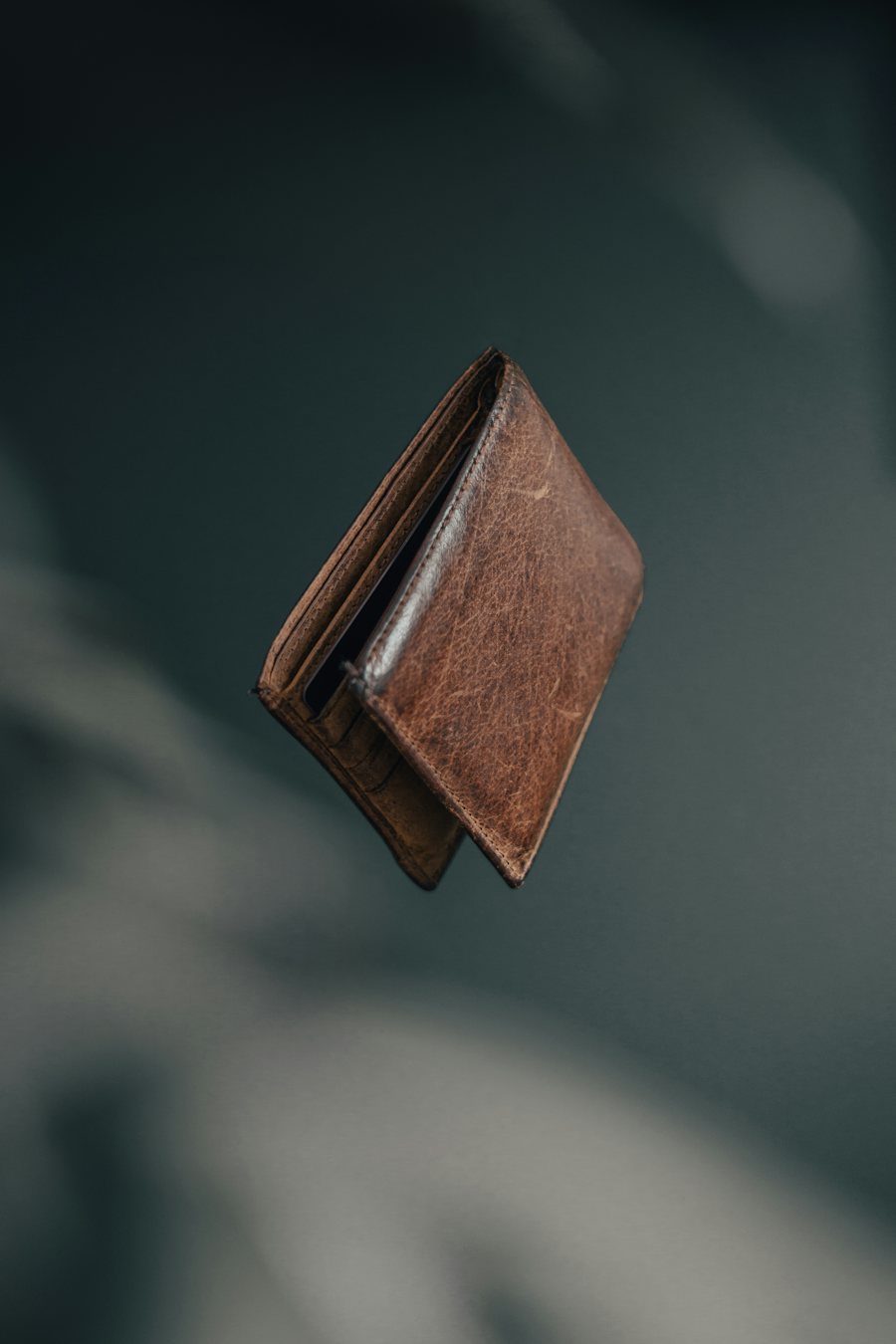 Brown leather wallet representing Lorcello leather goods